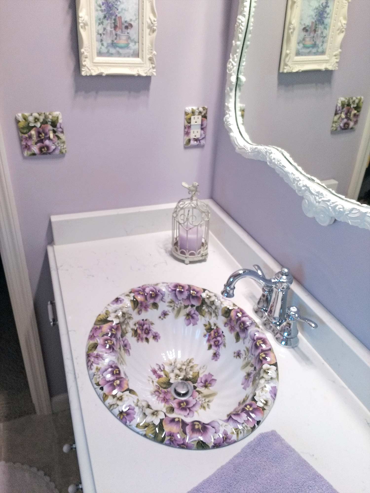 purple powder room with pansy sink
